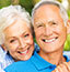 Elderly man and woman smiling