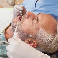 Close of an older man during a dental checkup