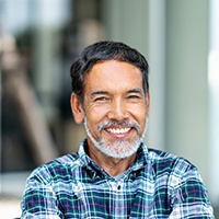 Man smiling with dental implants in Asheville