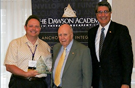 Asheville Dentist, Dr. John White receiving an award