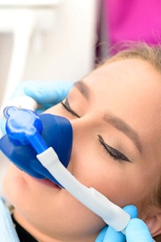 Woman relaxing while under the influence of nitrous oxide