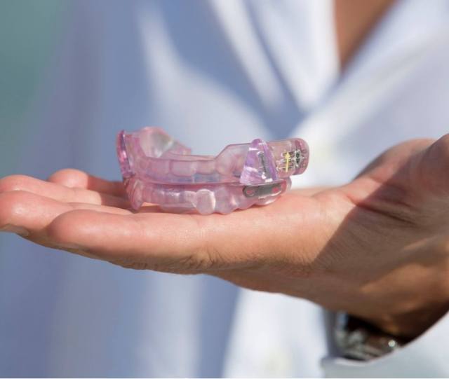 Holding oral appliance for TMJ treatment in Asheville