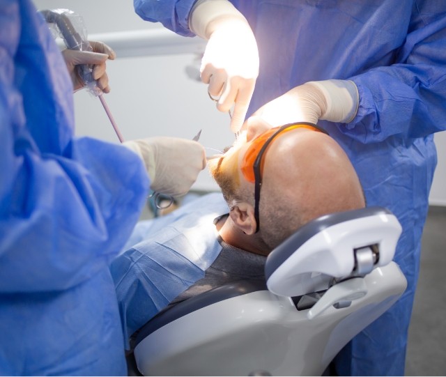 Male dental patient having his smile treated