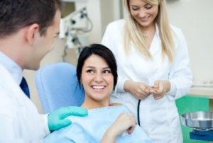 Female patient smiling in the dental chair