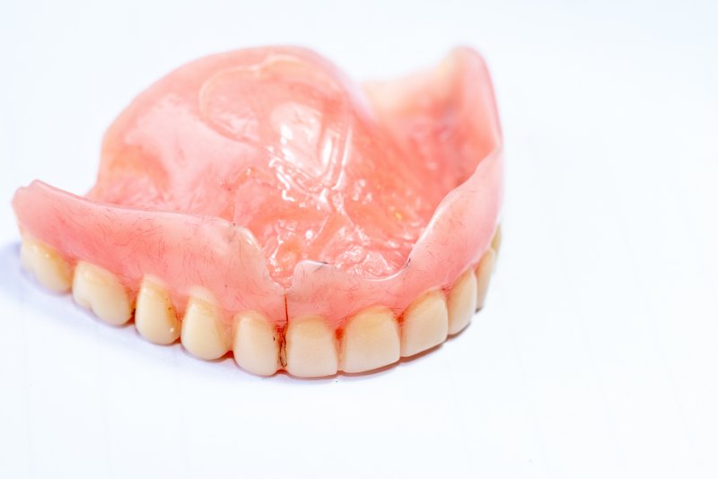 A cracked upper arch of dentures.
