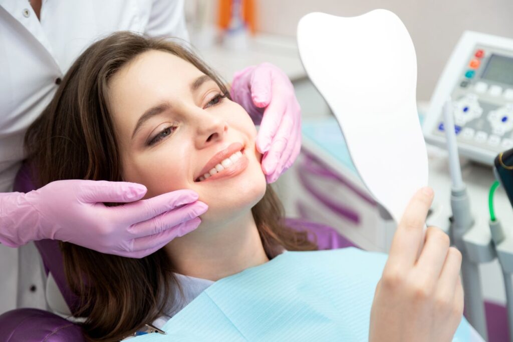 A woman at the dentist’s office getting a smile makeover